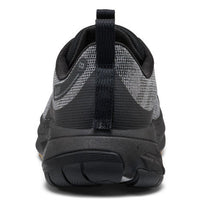 Black and gray athletic shoe on a white background