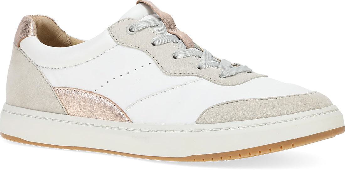 A low-top sneaker in white leather with light beige suede panels and metallic rose gold accents on the heel and side, featuring white laces and a white midsole with a gum outsole.