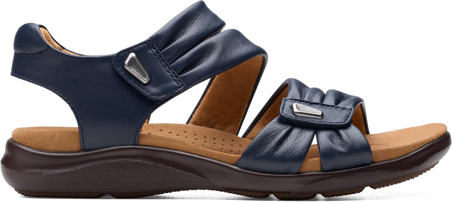 Quarter turn view Women's Clarks Footwear style name Kitly Ave Wide in color Navy. Sku: 26177305W