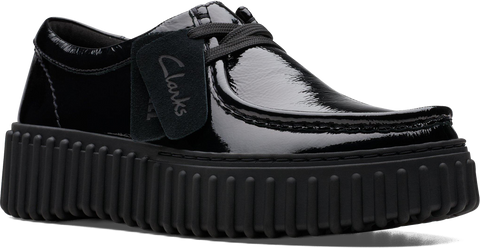Quarter turn view Women's Clarks Footwear style name Torhill Bee in color BLACK PAT. Sku: 26179111