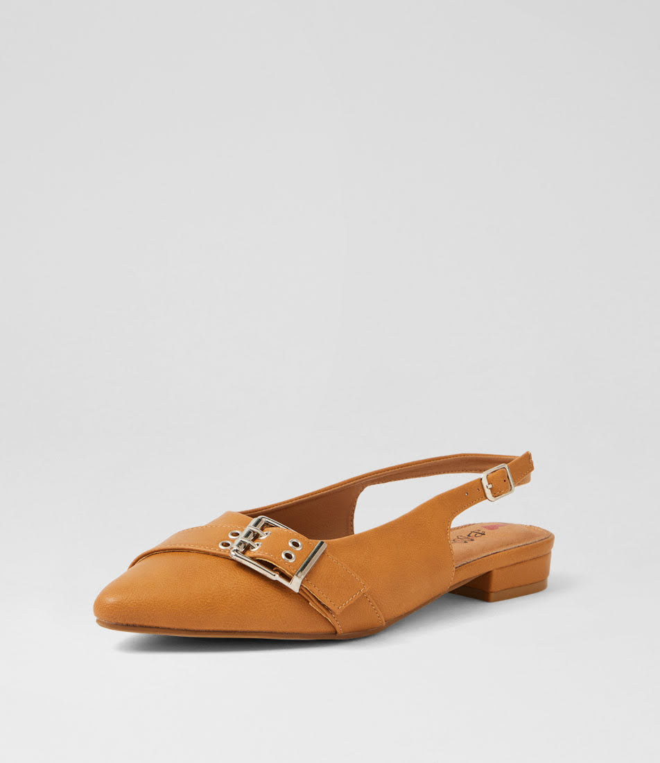 A single tan leather slingback flat shoe with a pointed toe, low block heel, and a decorative silver-tone buckle detail across the instep, shown against a light gray studio background.