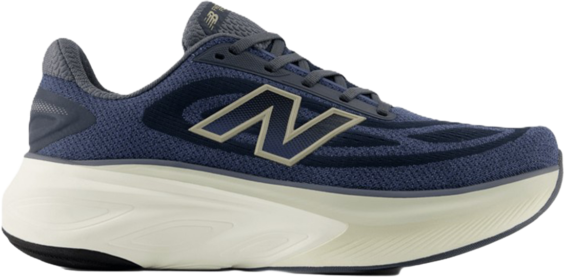 A New Balance running shoe in navy blue with a thick cream-colored midsole and a metallic gold &