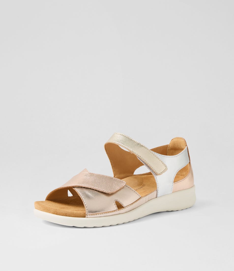 Sandal with beige and white straps on a light gray background