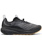 Black running shoe with brown sole on a white background
