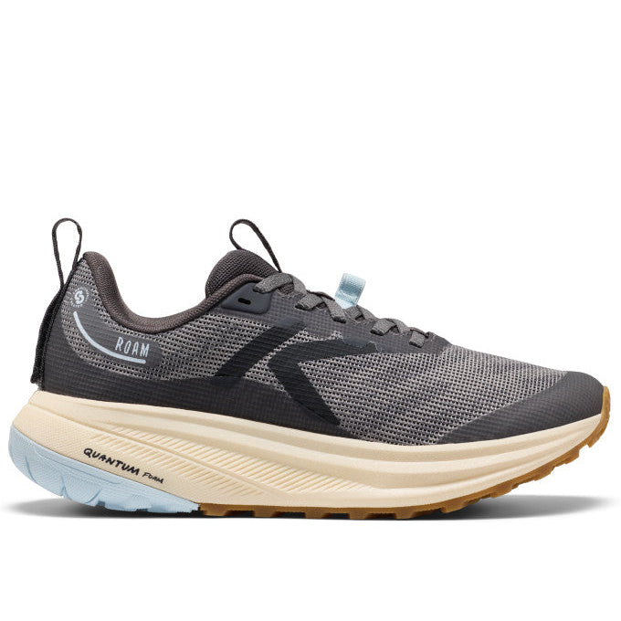 Gray running shoe with a white sole on a white background